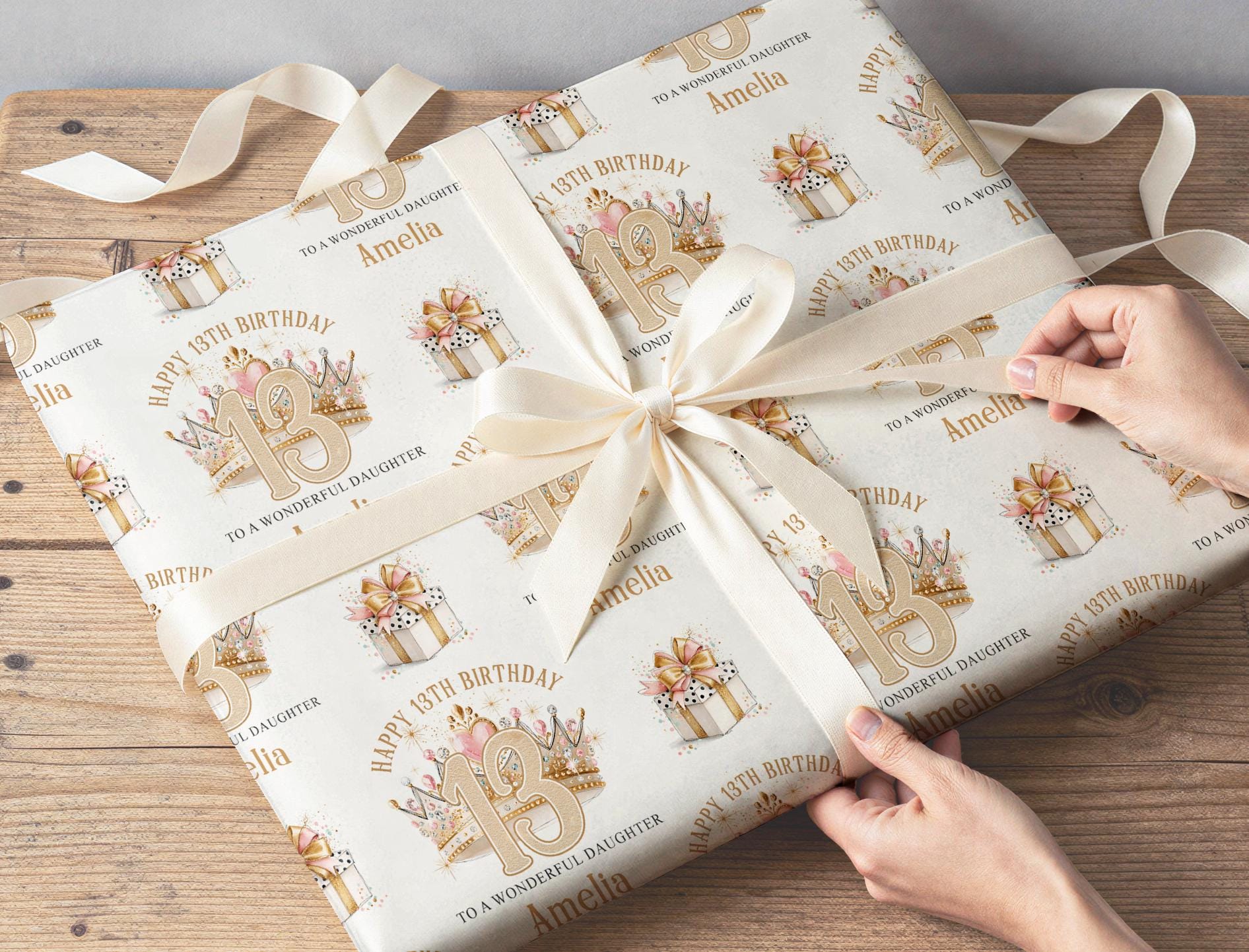 Personalised crown wrapping paper shown rolled and wrapped around a gift box to demonstrate the finished look.