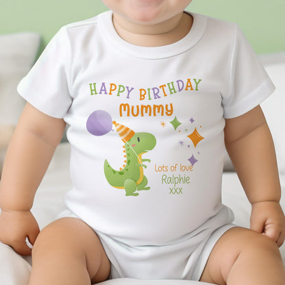 Close-up of the party dinosaur design with 'Happy Birthday' message and custom baby name