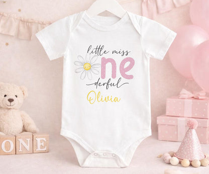 Personalised first birthday vest with daisy party design and custom name, soft cotton.