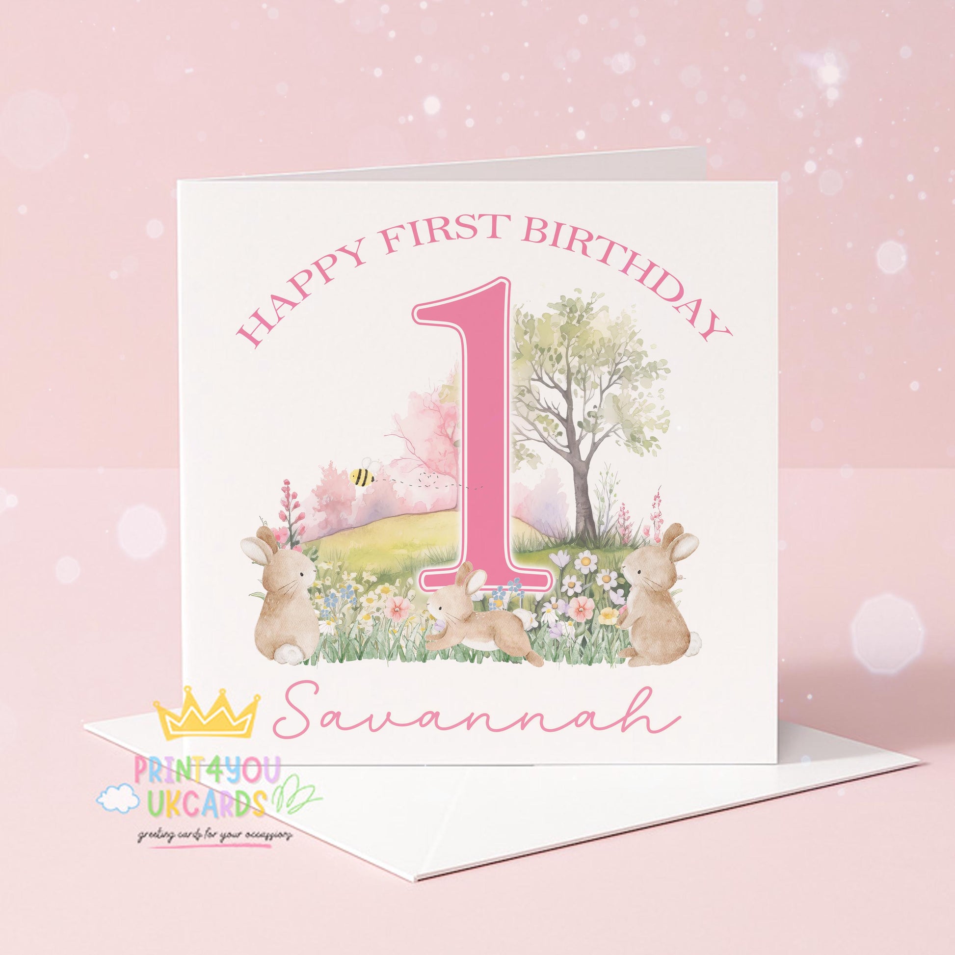 Front view of the personalised pink bunny first birthday card printed on premium 350gsm card stock.