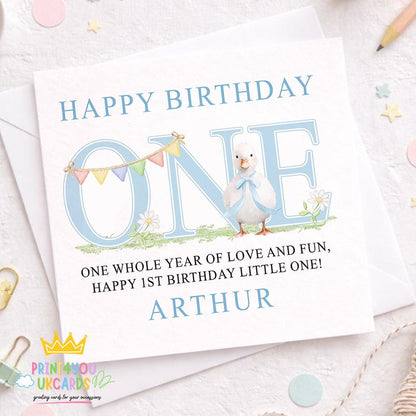 Front view of the personalised blue duck first birthday card printed on 350gsm card stock.