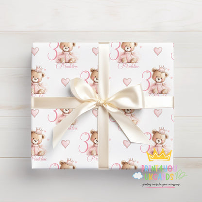 Gift wrapped in the personalised pink princess teddy bear wrapping paper, tied with ribbon.