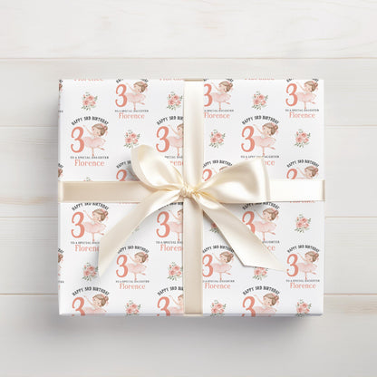 Roll of personalised ballerina wrapping paper packaged in a postal tube ready for delivery.