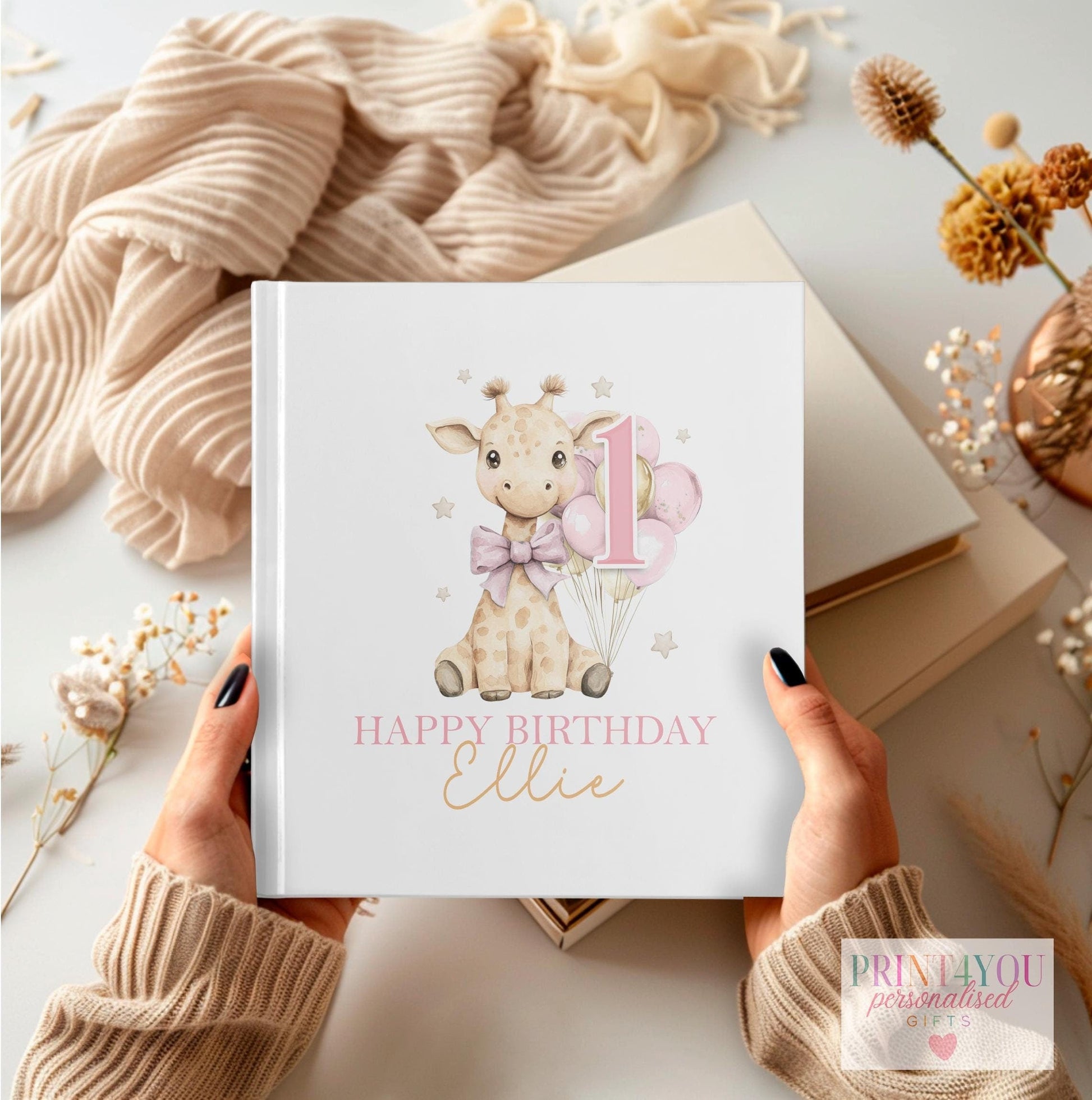 Personalised first birthday photo album with baby giraffe design for girls, 22x22cm PU cover, holds 76 photos