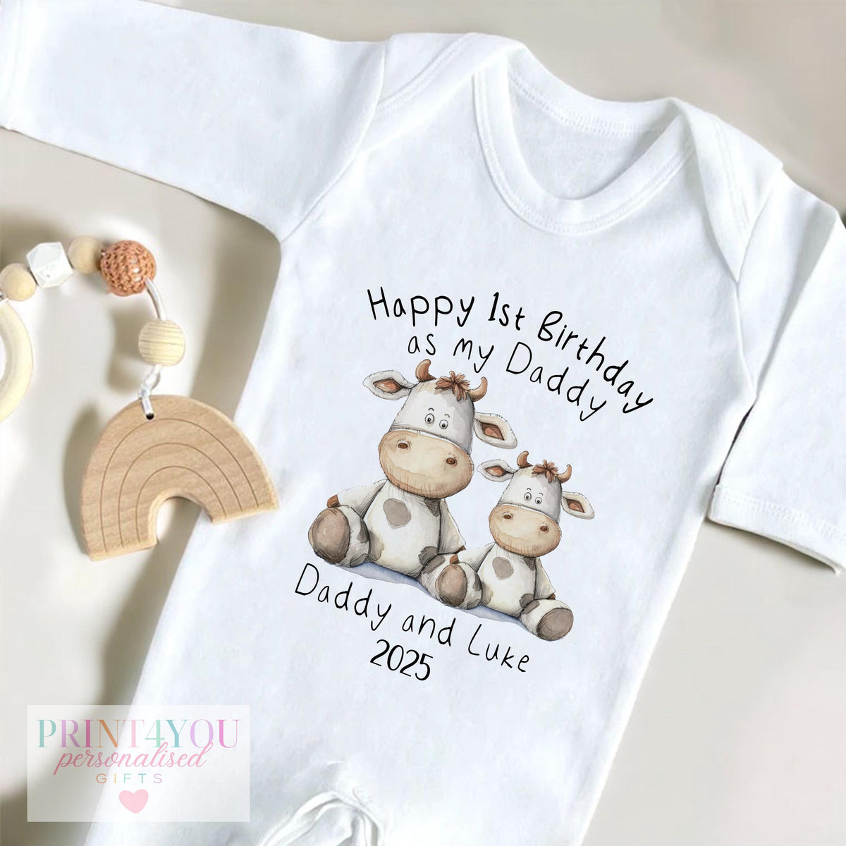 Personalised 'Happy 1st Birthday as my Daddy' bib, printed with the two little cows design and Daddy and baby's name.