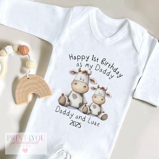 Personalised 'Happy 1st Birthday as my Daddy' bib, printed with two little cows and Daddy and baby's name.