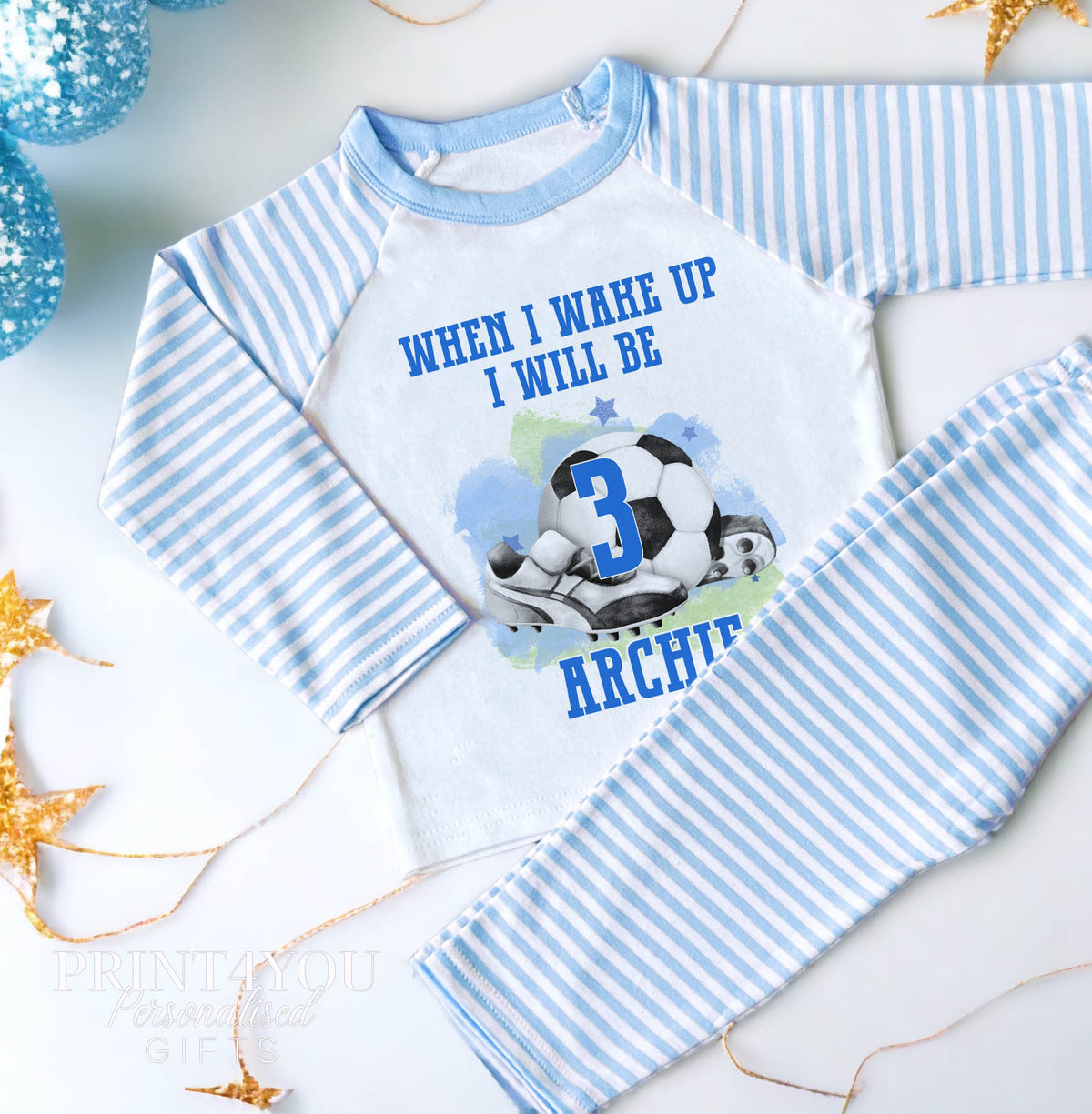 Personalised blue and white striped football pyjamas for boys with 'When I Wake Up' football print and custom name on the front, size 1-2 years