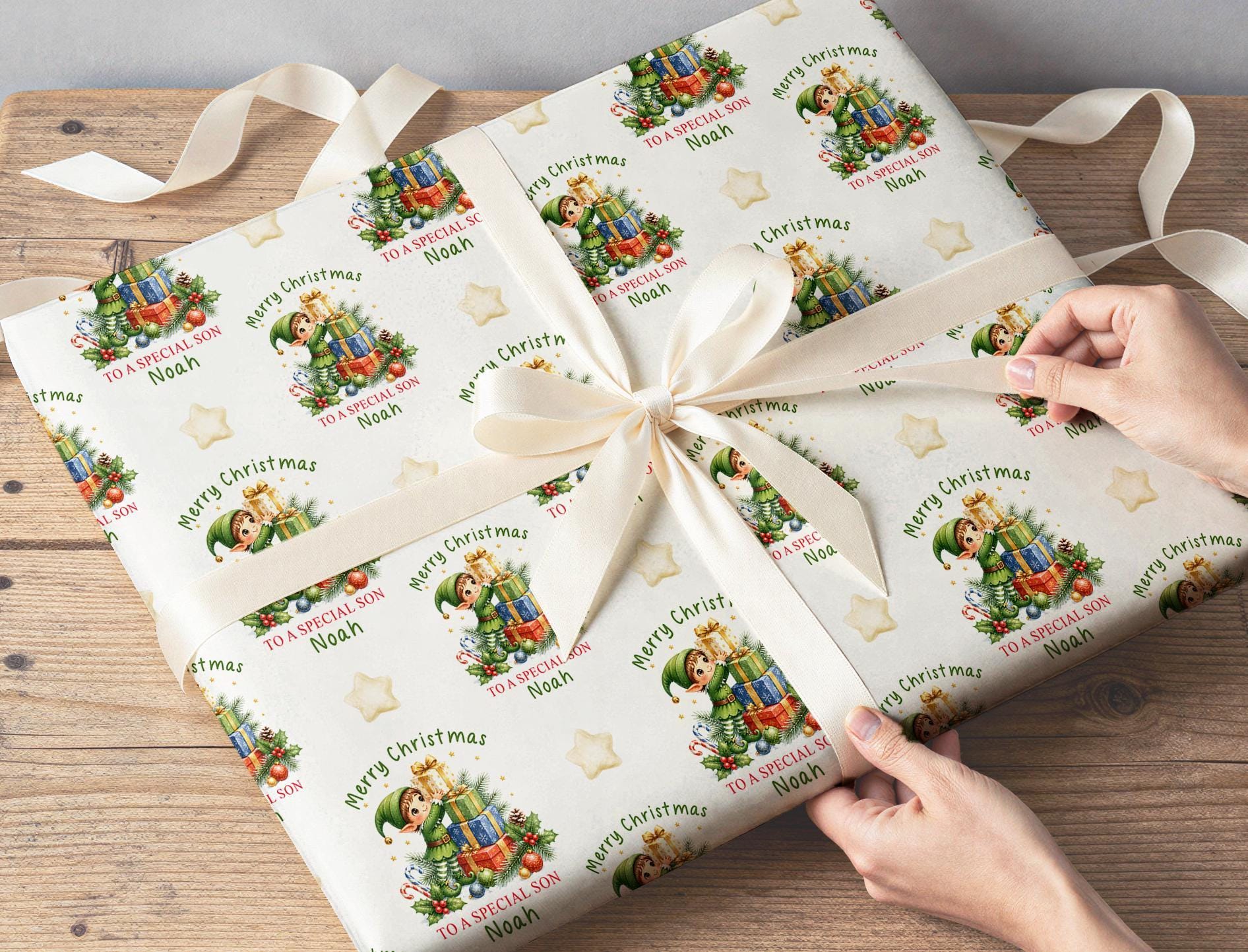 A gift wrapped in the personalised elf Christmas wrapping paper
