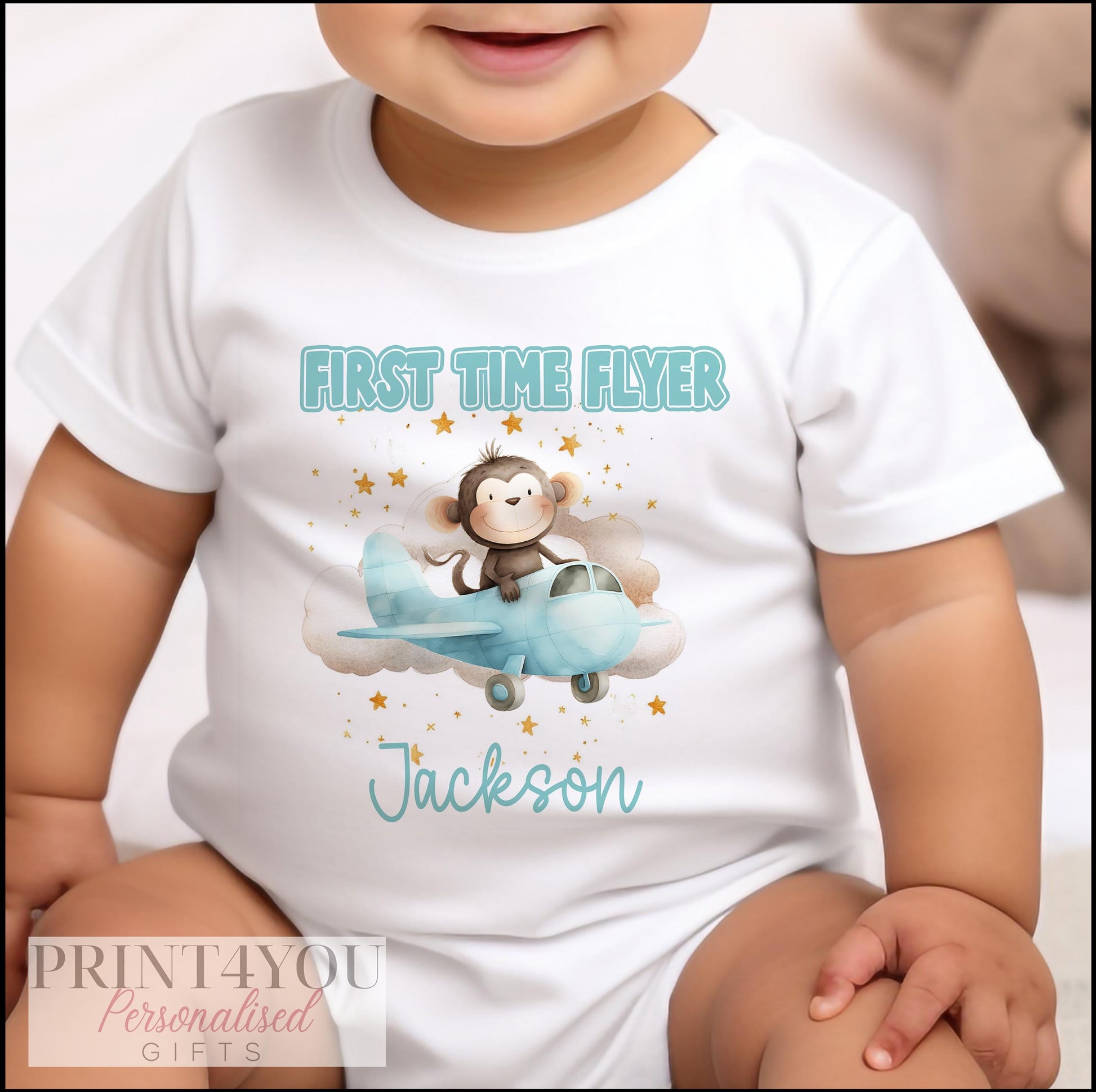 Personalised first flight monkey baby vest, custom printed with a name.