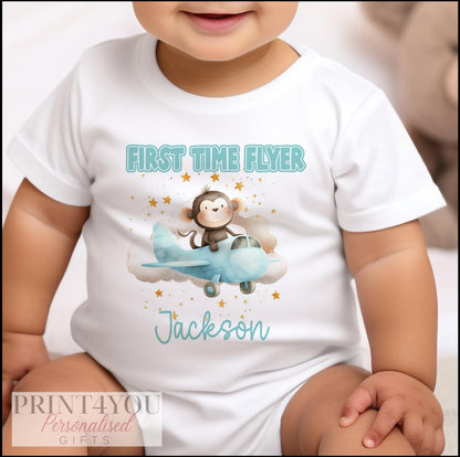 Personalised first flight monkey baby vest, custom printed with a name.