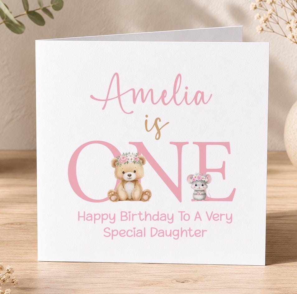 Personalised first birthday card, white 6x6 inch square card printed with a name in pink script above a large ONE with a teddy bear and mouse
