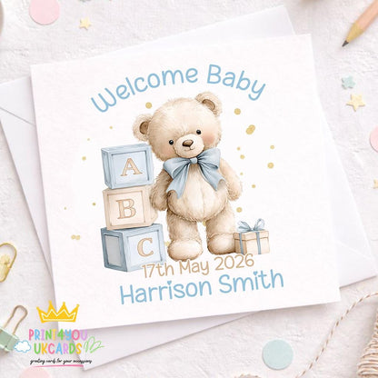 Square greeting card showing the front design of the Welcome Baby Boy card.