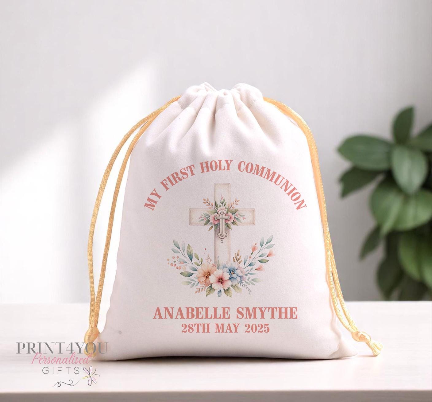 Personalised velvet communion gift pouch shown with rosary beads inside