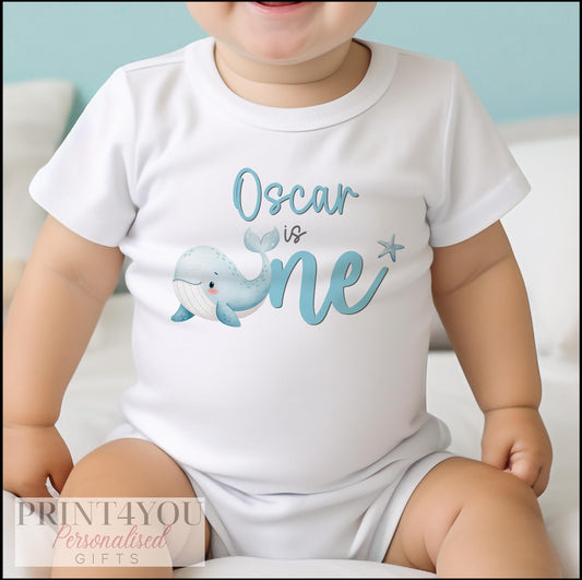 Personalised ocean whale first birthday bib printed with child's name