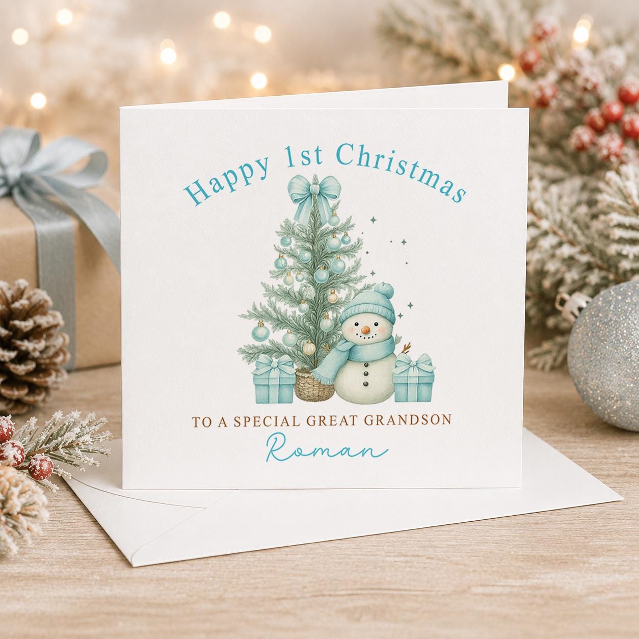 Personalised first Christmas card, white 6x6 inch square card printed with a snowman, a blue Christmas tree and Happy 1st Christmas with a name
