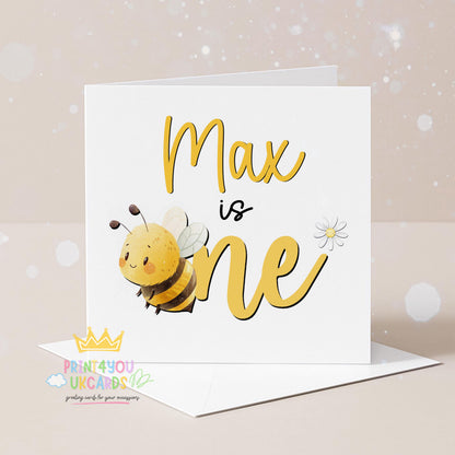 Front view of the personalised bee first birthday card printed on 350gsm card stock.
