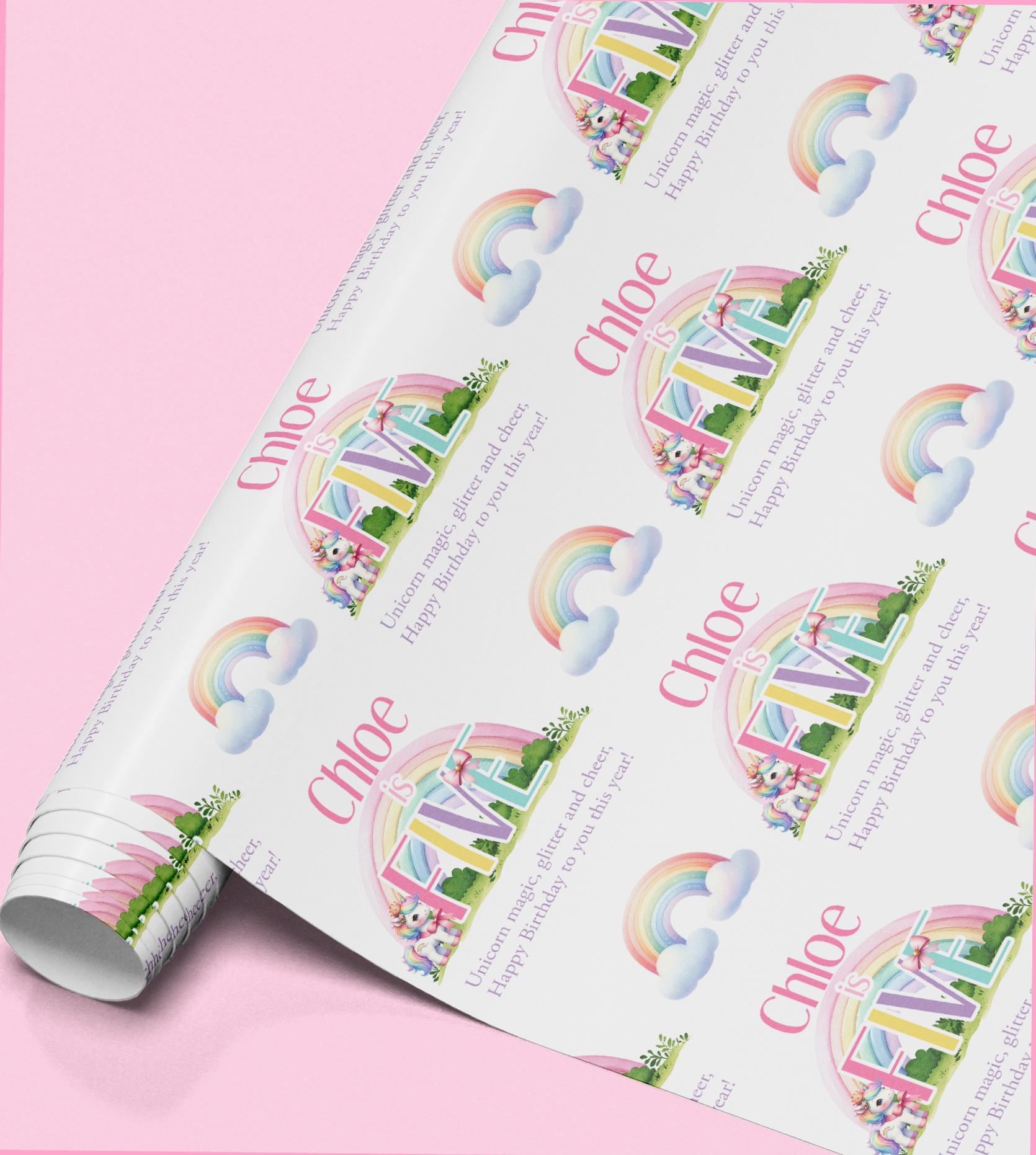 Personalised rainbow unicorn wrapping paper design shown with a sample name and age