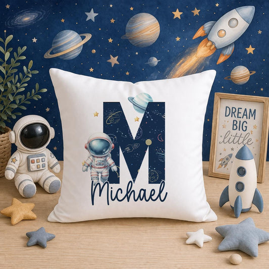 Personalised space-themed cushion printed with a child's name among stars and planets