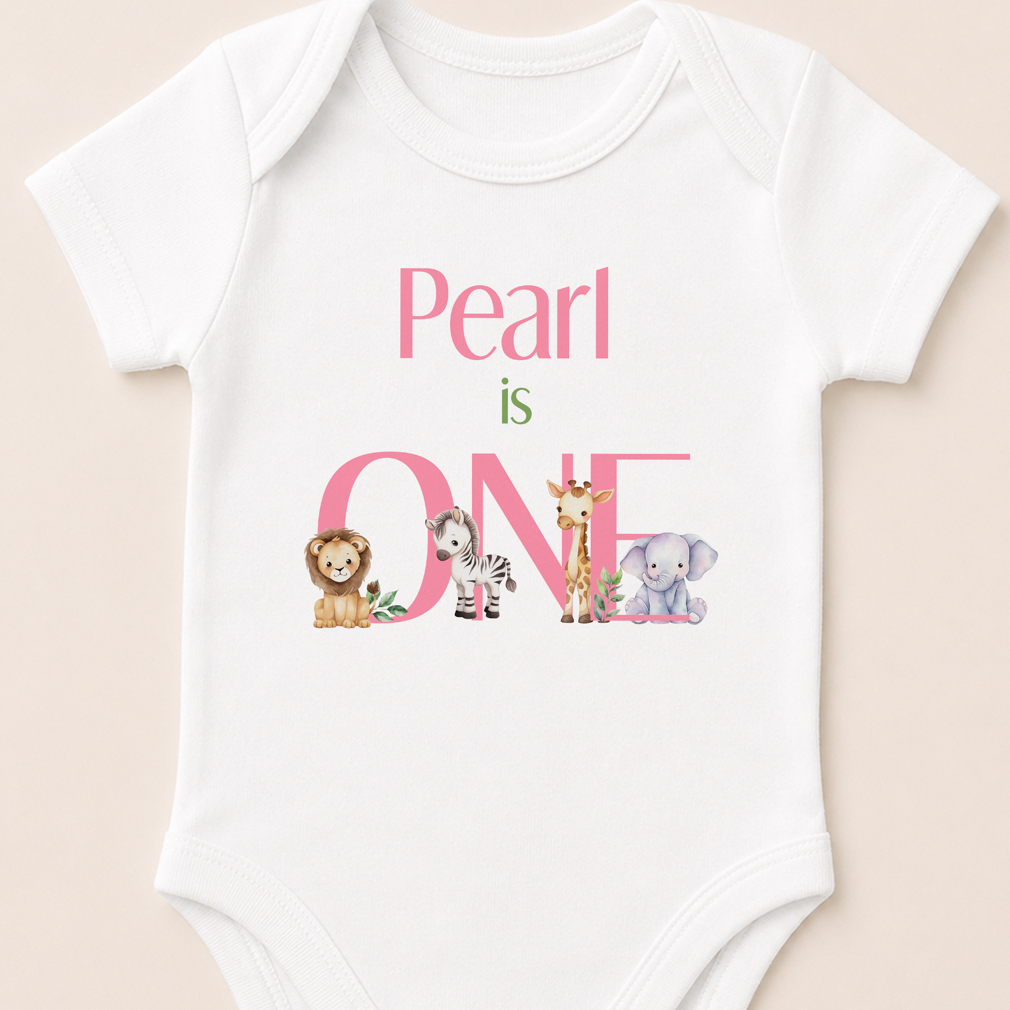 Personalised safari first birthday vest with pink 'is ONE' text and safari animal print.