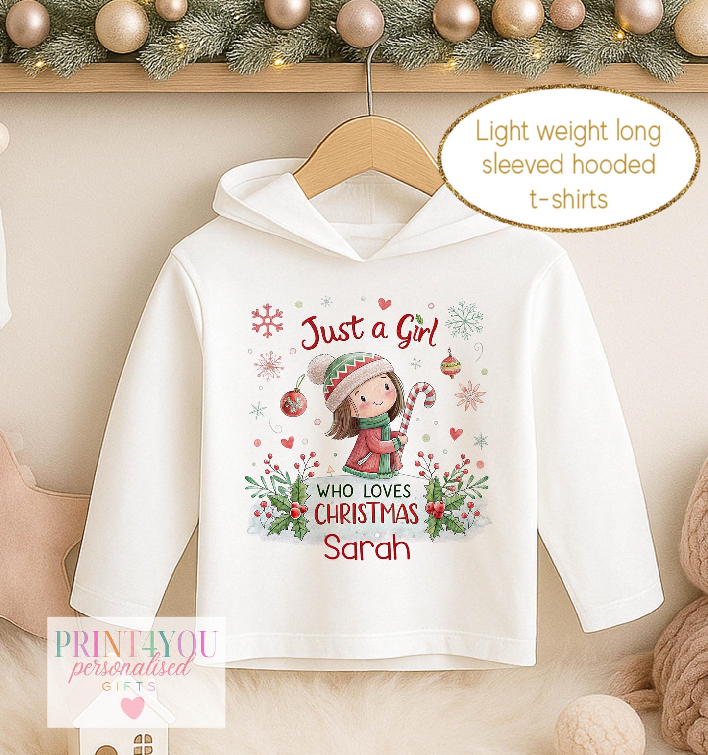 Personalised Christmas hooded t-shirt, white long sleeved hoodie printed with Just a Girl Who Loves Christmas, a girl in a red coat and a name