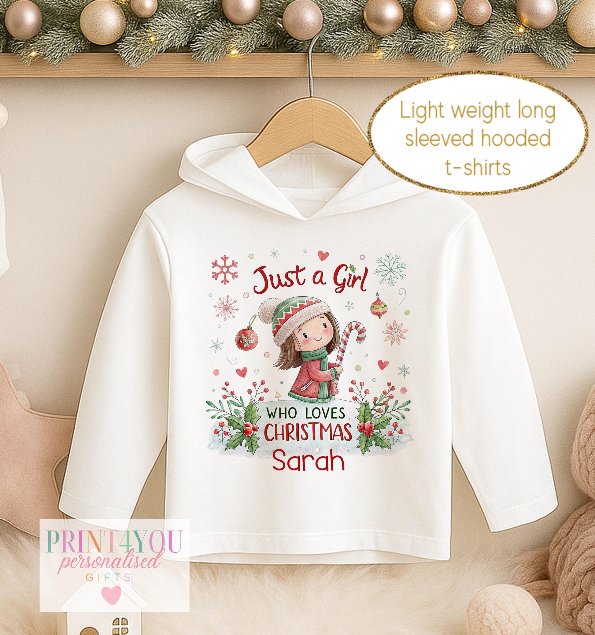 Personalised Christmas hooded t-shirt, white long sleeved hoodie printed with Just a Girl Who Loves Christmas, a girl in a red coat and a name