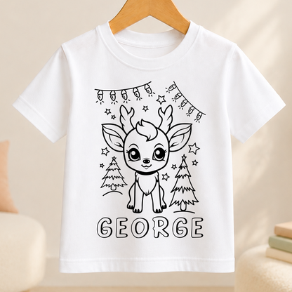 A white t-shirt with a black and white illustration of a cartoon reindeer and Christmas trees, along with the name "GEORGE" written below.