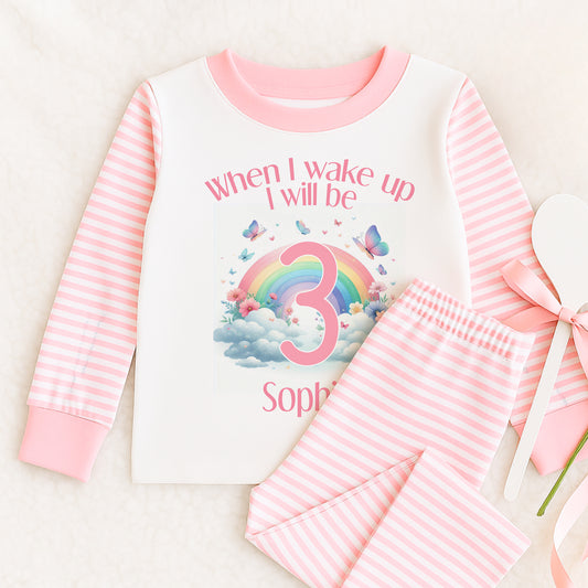 Personalised pink striped pyjamas with rainbow and butterfly print, size 6-12 months