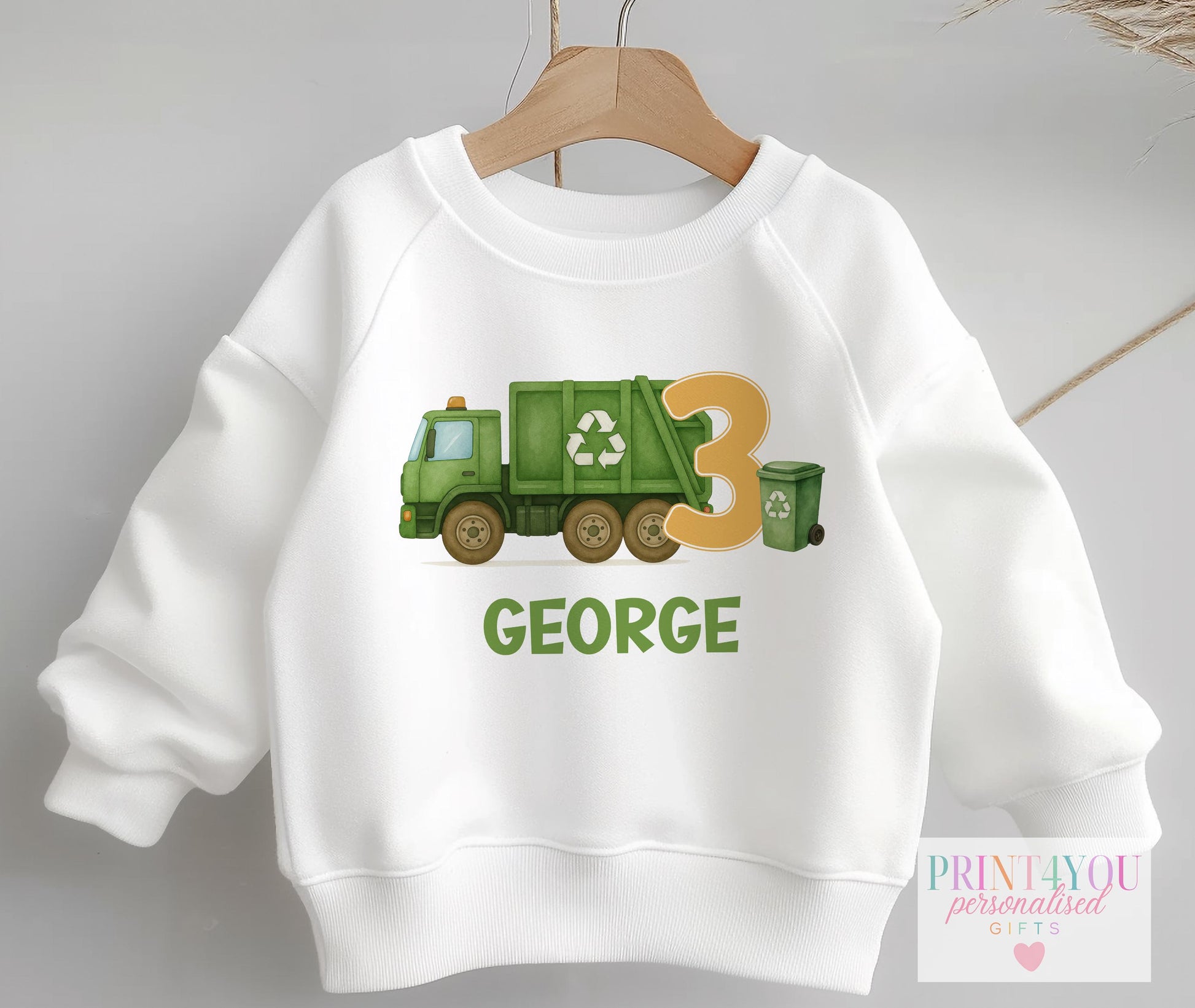Children's clothing with the rubbish truck jumper design