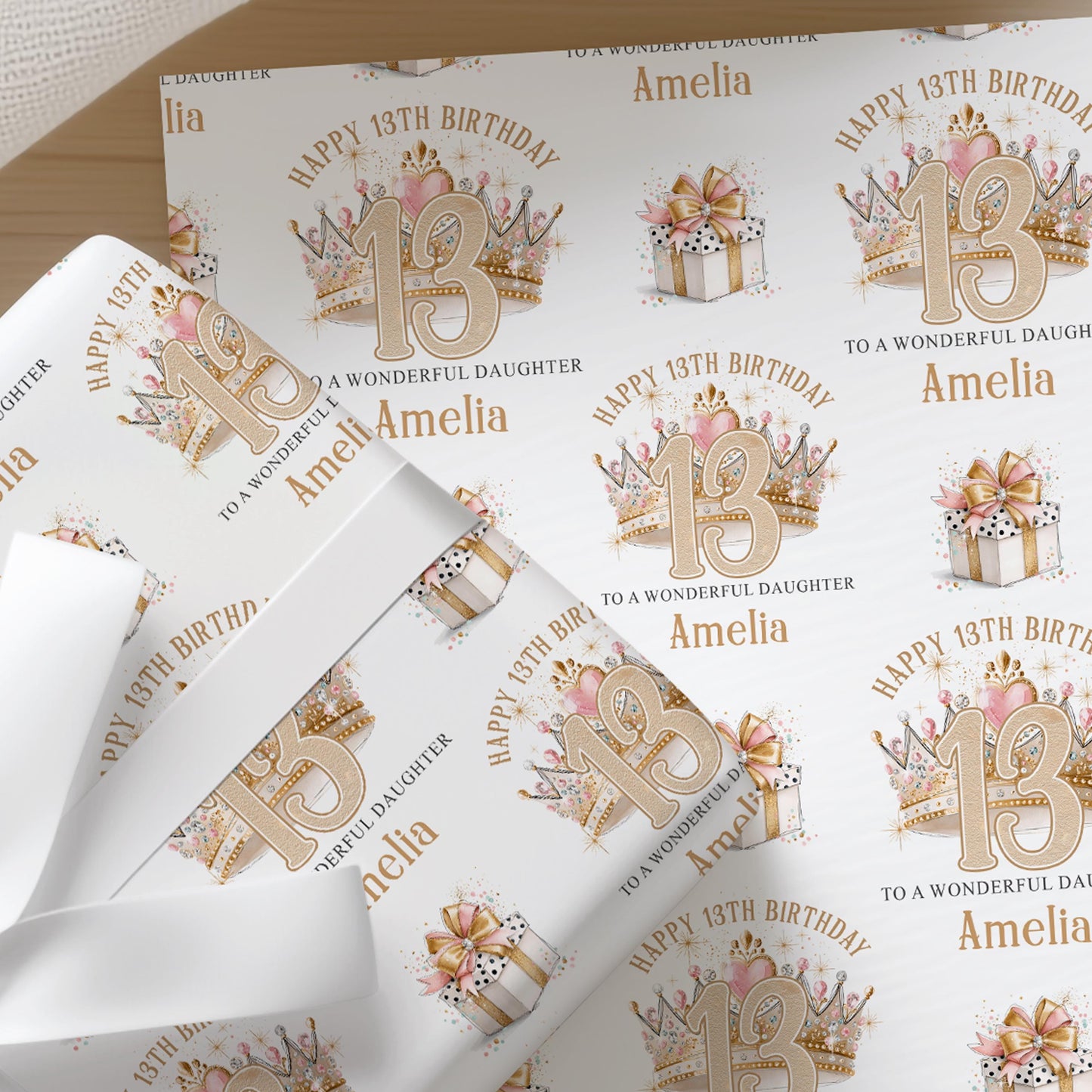 Personalised birthday wrapping paper featuring a glitter-style crown design with custom name, age and relation, luxury gift wrap for girls.