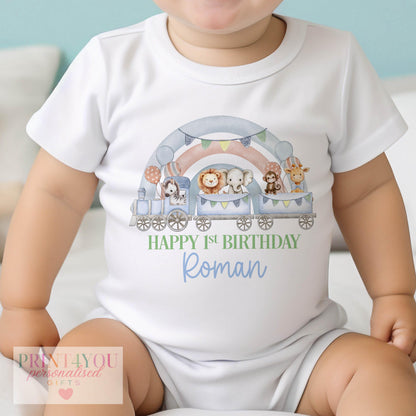 Personalised safari train rainbow birthday vest featuring a zebra, lion, elephant, monkey and giraffe design.