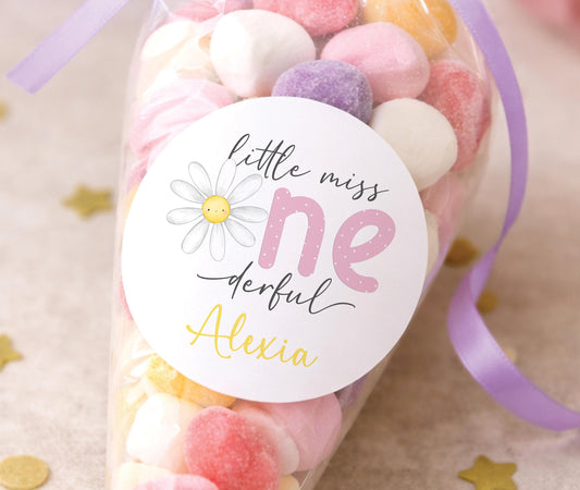 Sheet of personalised daisy 1st birthday stickers used as party bag seals