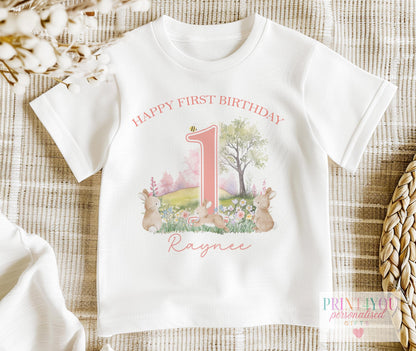 Personalised bunny rabbit first birthday sleepsuit with popper fastenings and printed name.