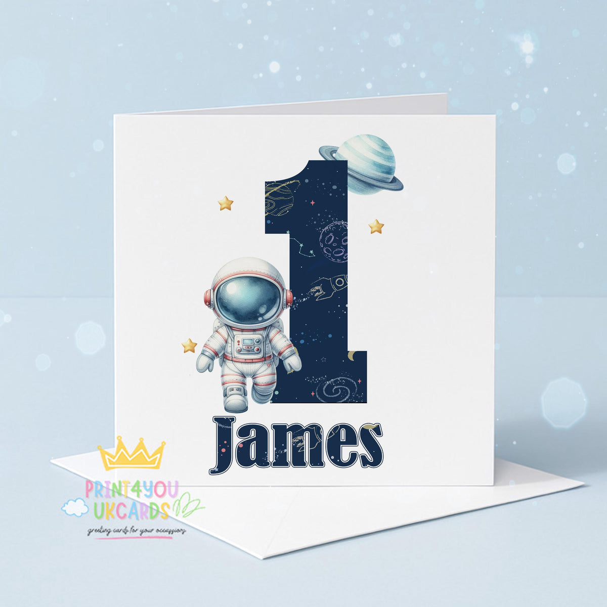 Personalised astronaut birthday card in a bright galaxy design with stars and planets, front view showing space for custom name and age, 6x6 inch luxury card