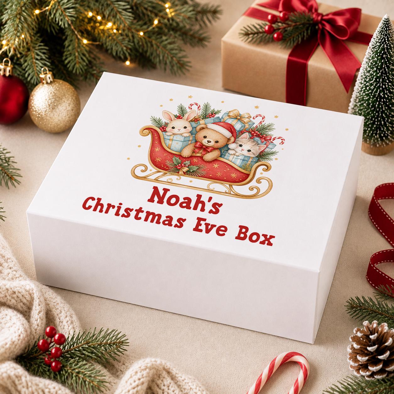 Personalised Christmas Eve box, white magnetic gift box printed with teddy bears in a red sleigh of presents and a name above Christmas Eve Box