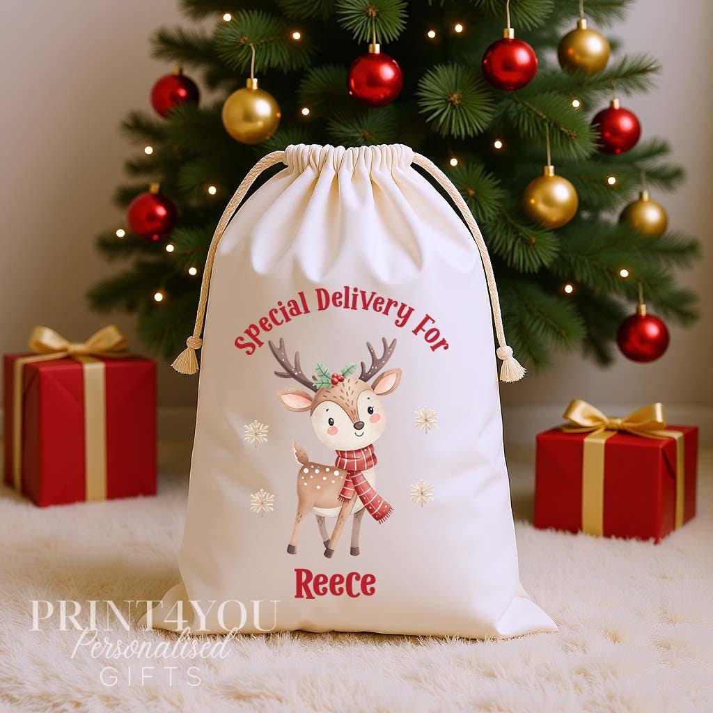 Personalised reindeer Christmas sack, cream cotton drawstring santa sack printed with a reindeer in a red scarf and Special Delivery For a name