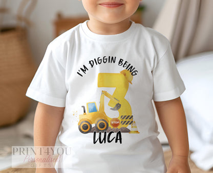 Child wearing personalised white construction digger birthday t-shirt