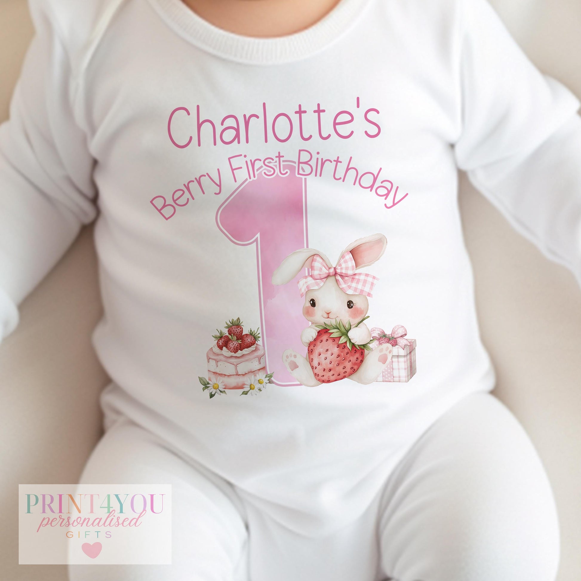 Personalised strawberry bunny first birthday outfit, ready for your baby's name to be added.