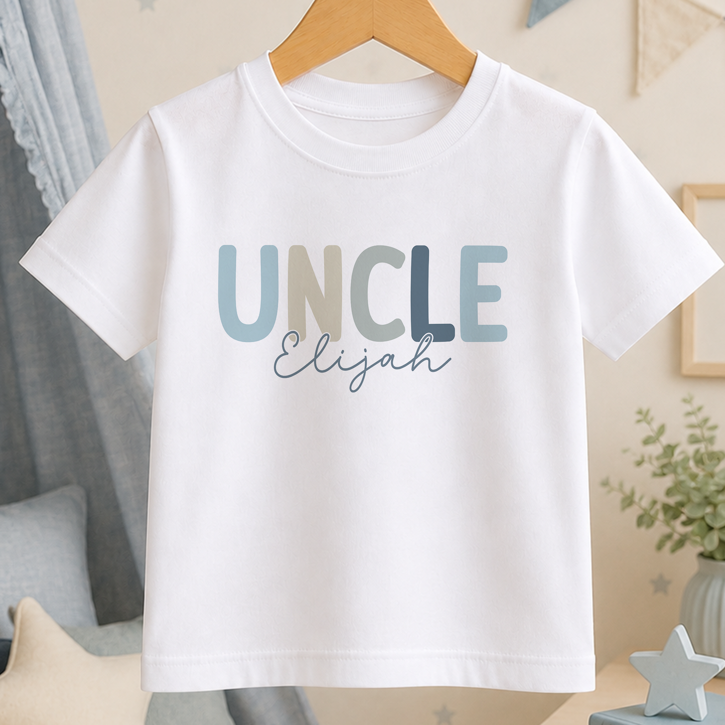 A white t-shirt with the text "UNCLE Elijah" printed on it.