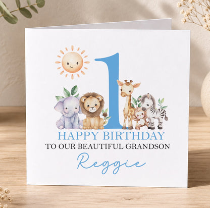 Personalised first birthday card featuring safari animals - lion, giraffe, zebra and elephant - around a blue number one, with a custom name and relation on the front.