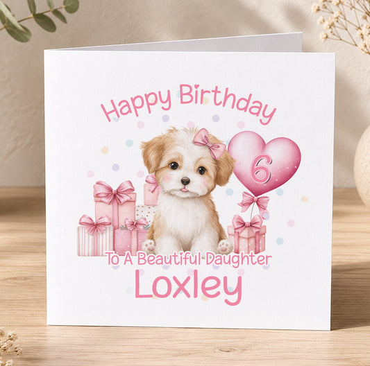Pink personalised puppy birthday card featuring a puppy with a bow, pink gift boxes and a heart with the child's age, personalised for Loxley.