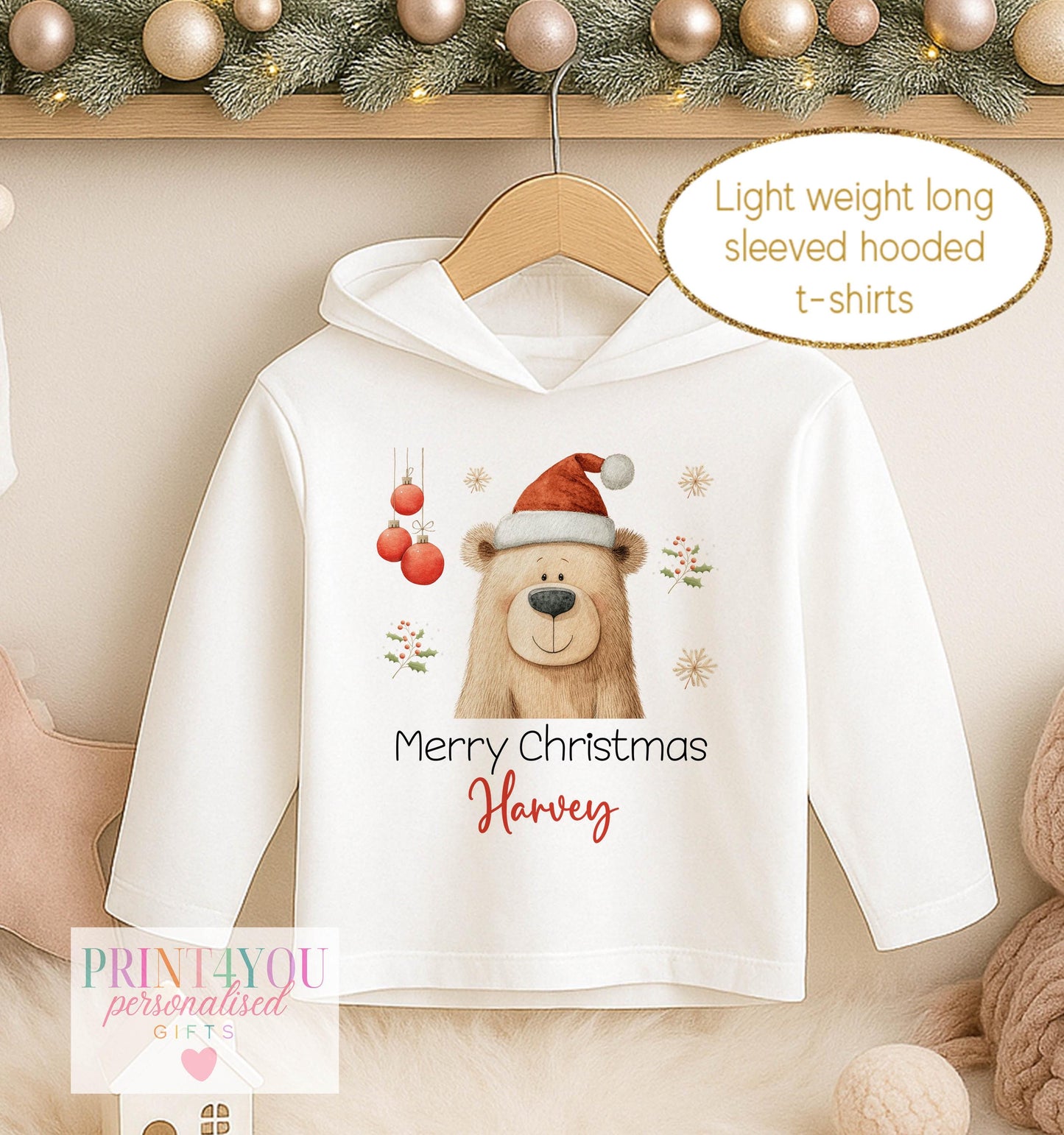 Personalised Christmas hooded t-shirt, white long sleeved hoodie printed with a bear in a red Santa hat, Merry Christmas and a name
