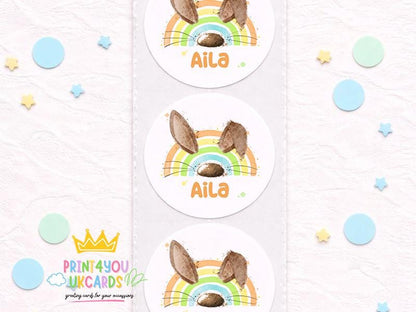Personalised rainbow bunny sticker sheet with a bunny hopping under a rainbow and a child's name