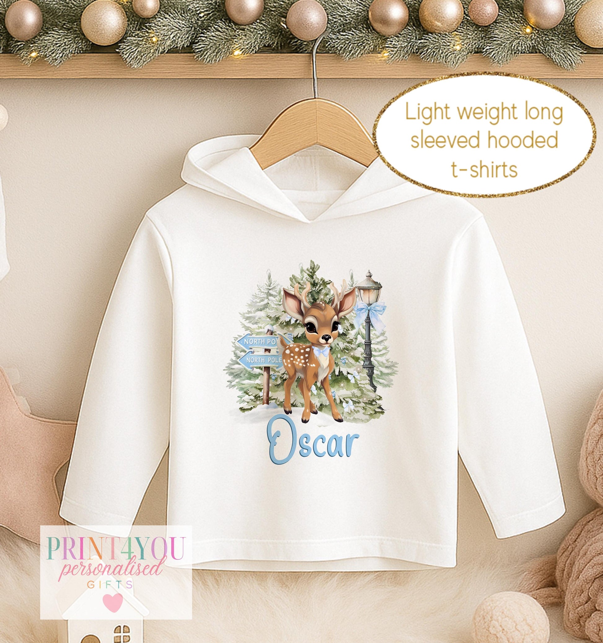 Personalised Christmas hooded t-shirt for kids, white lightweight long sleeved hoodie printed with a woodland fawn design and a name