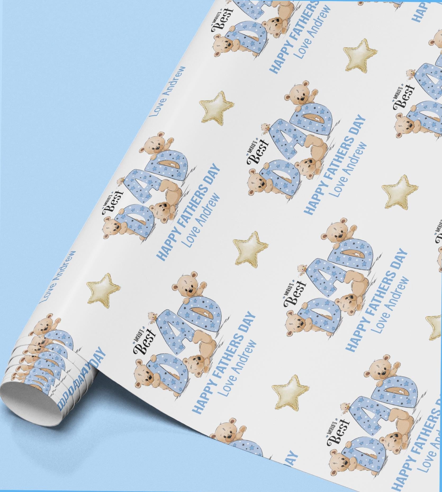 Roll of Father's Day wrapping paper with teddy bears and stars, printed with 'Happy Father's Day' and the personalised message 'Love Andrew'.