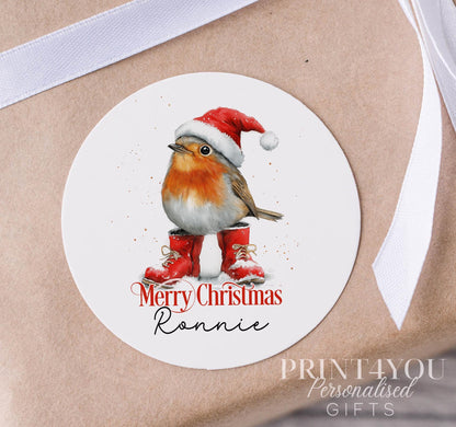 Personalised Christmas sticker on a strip, glossy white 5cm round gift label printed with a custom name