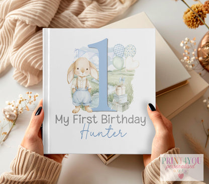 Personalised first birthday photo album with blue rabbit and balloons design and custom name on the cover
