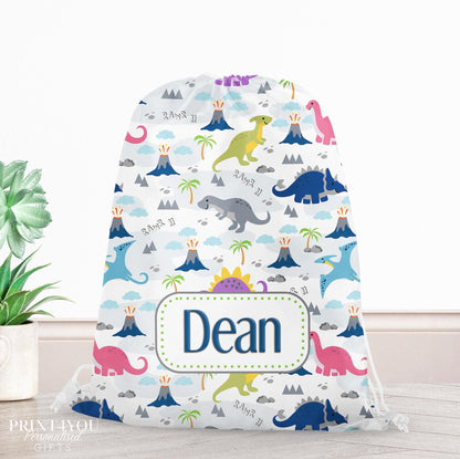 Personalised dinosaur print drawstring PE bag with a child's name printed on the front