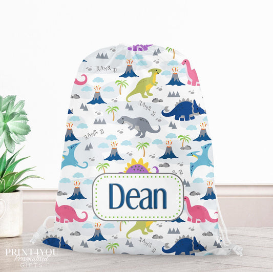 Personalised dinosaur print drawstring PE bag with a child's name printed on the front
