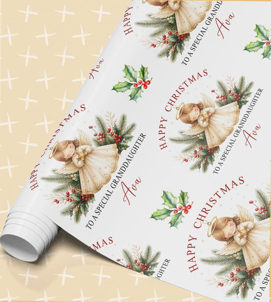 Rolled sheet of personalised angel Christmas wrapping paper printed with a name and Happy Christmas