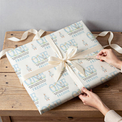 Gift wrapped in the personalised blue duck wrapping paper, tied with ribbon.
